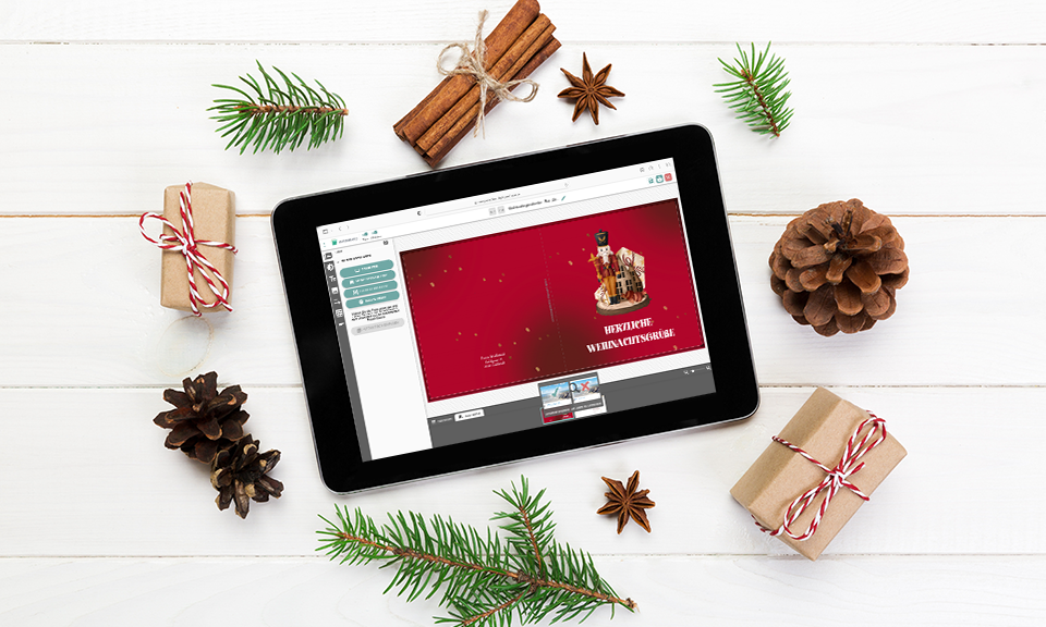 ablet mit Konfigurator um Weihnachtskarten mit besonderen Designs zu gestalten